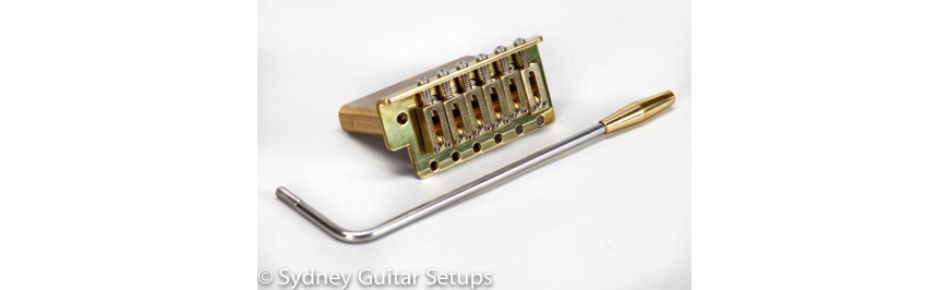 Fender bridge brass strat-